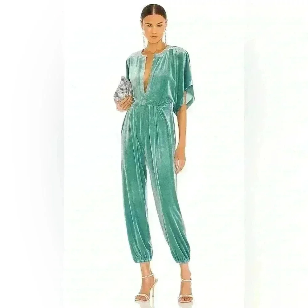 NORMA KAMALI Rectangle Jog Velvet Jumpsuit In purple.